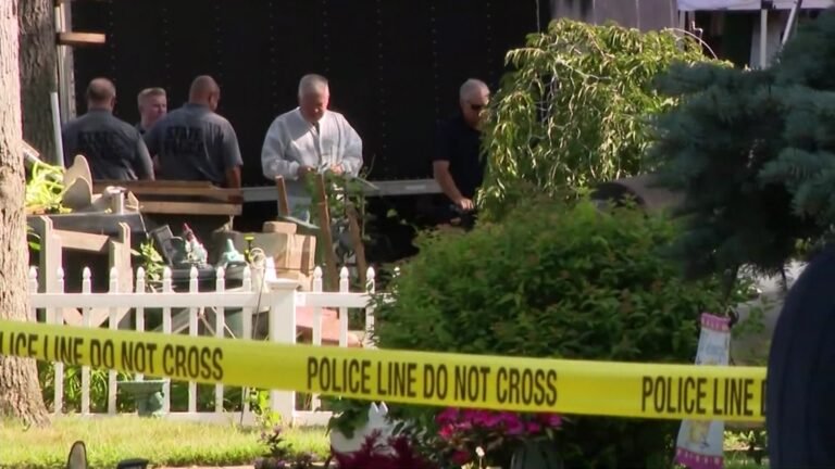 The backhoe starts digging in suspect Rex Heuermann’s yard