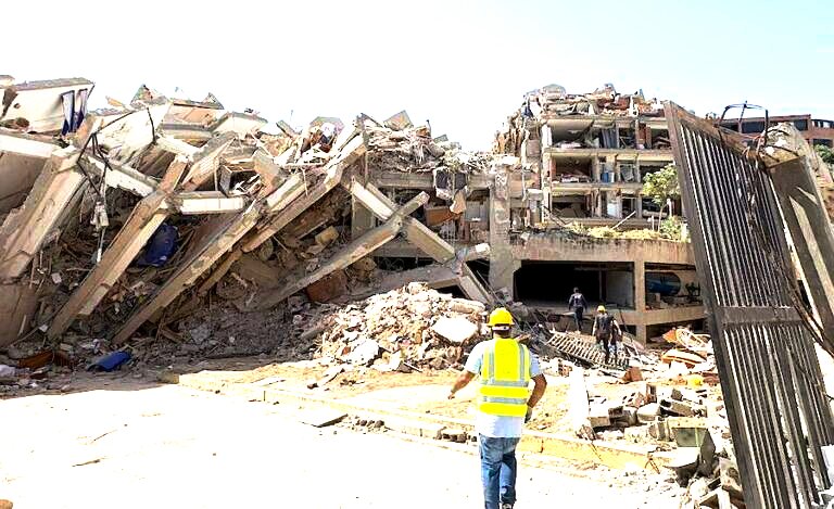 On the ground, engineers assess the damage in the Venezuela earthquake zone