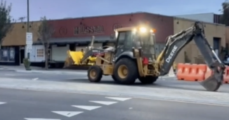 A man steals a backhoe and goes on a destructive drive through the North Park neighborhood